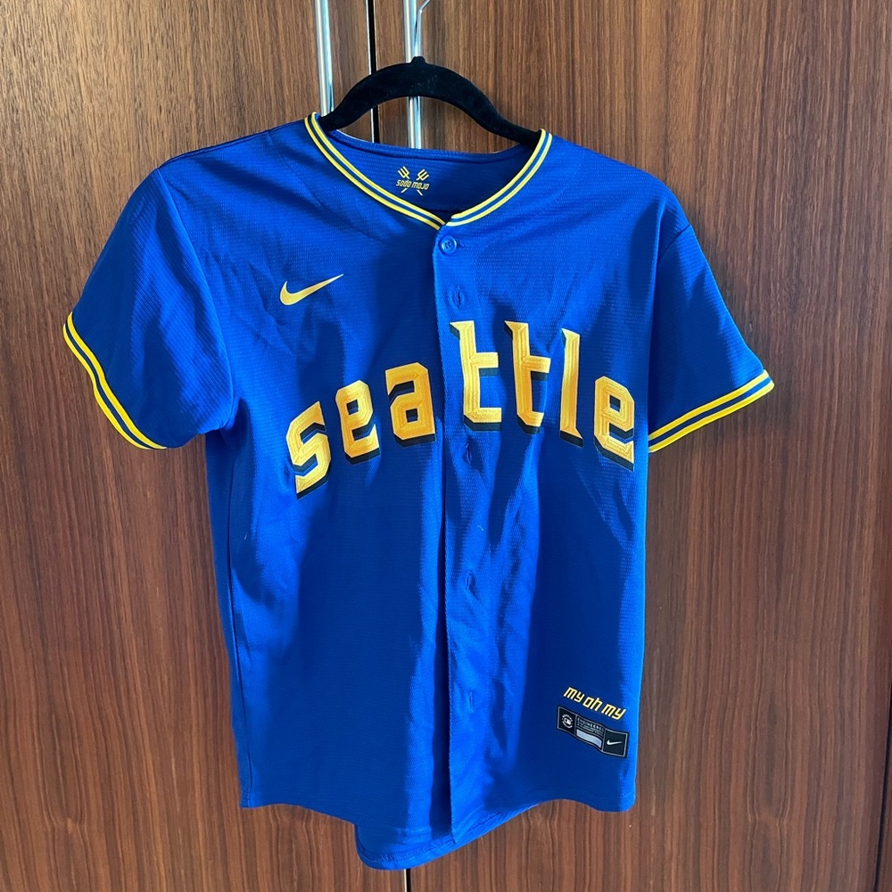 Nike Blue Jersey with Yellow Text